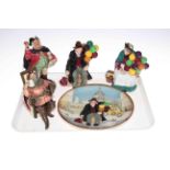 Four Royal Doulton figures: Town Crier HN2119, The Foaming Quart HN2162, The Balloon Man HN1954,