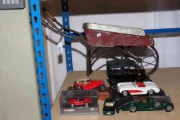 Vintage child's wheelbarrow and six model vehicles including three Franklin Mint.