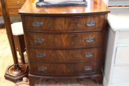 Mahogany bow front chest of four long drawers on slight ogee bracket feet, 92cm high, 87cm wide,