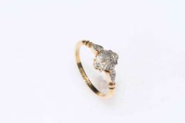 18 carat gold and platinum eight stone diamond ring, size O.