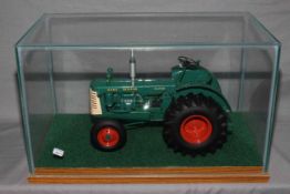 Franklin Mint 'The Oliver Super 99 Tractor' in glazed case.