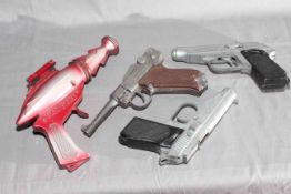 Seven assorted unboxed Cap Firing Pistols including Lone Star Dan Dare plus a pair of Deputy Dan