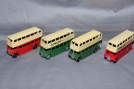 Four Dinky 290 Double Decker Bus with 1st and 3rd type grill. Good to Very Good unboxed.