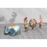 TPS (Japan) clockwork tinplate Elephant towing 3 Clowns. Excellent clockwork motor works.