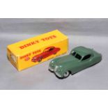 Dinky 157 Jaguar XK120 Coupe with spun hubs. Near Mint in Very Good box with correct colour spot.