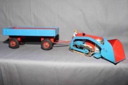 Gescha B-720 Western Germany tinplate Bulldozer and Four Wheel Trailer. Original tracks and driver.