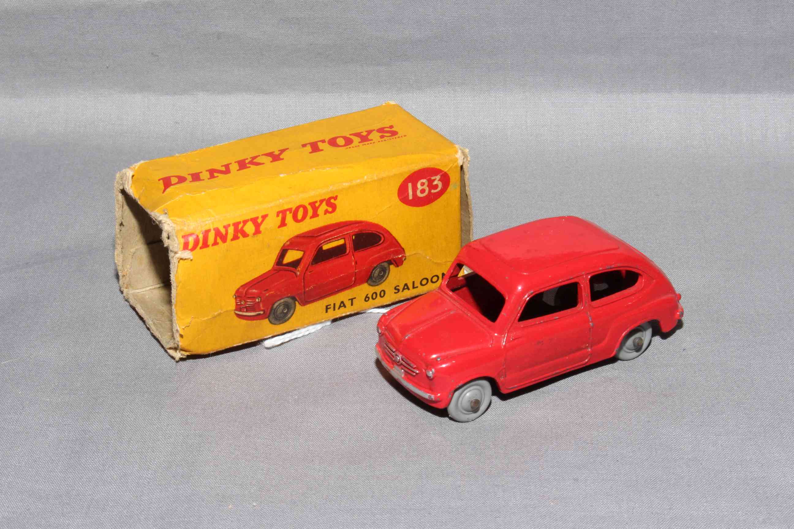 Dinky 183 Fiat 600 with plastic hubs. Excellent in poor box.