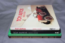 Two Paolo Rampini books on model cars and motorcycles, and two Toys Autos volumes.