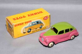 Dinky 152 Austin Devon. Near Mint in Fair tape repaired box with correct colour spot.