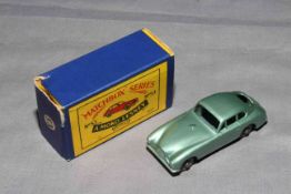 Moko Aston Martin DB2-4 MkI with metal wheels. Near Mint in Very Good box.