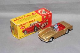 Dinky 114 Triumph Spitfire. Near Mint in Very Good box complete with inner packing cardboard ring.
