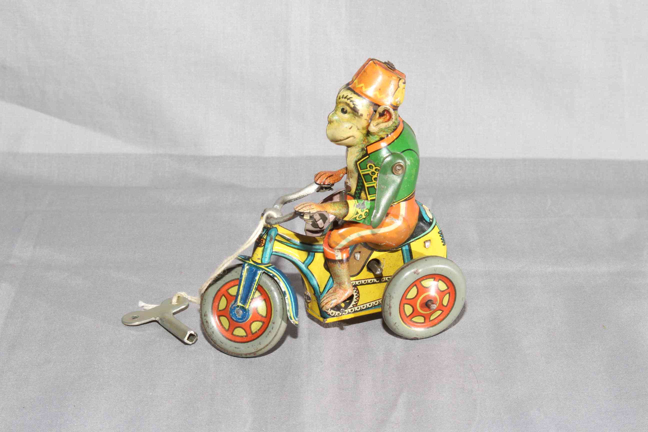 Arnold Germany US Zone clockwork tinplate Monkey on Tricycle. Very Good clockwork motor works. - Image 2 of 2
