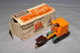 Moko Excavator with original rubber tracks.