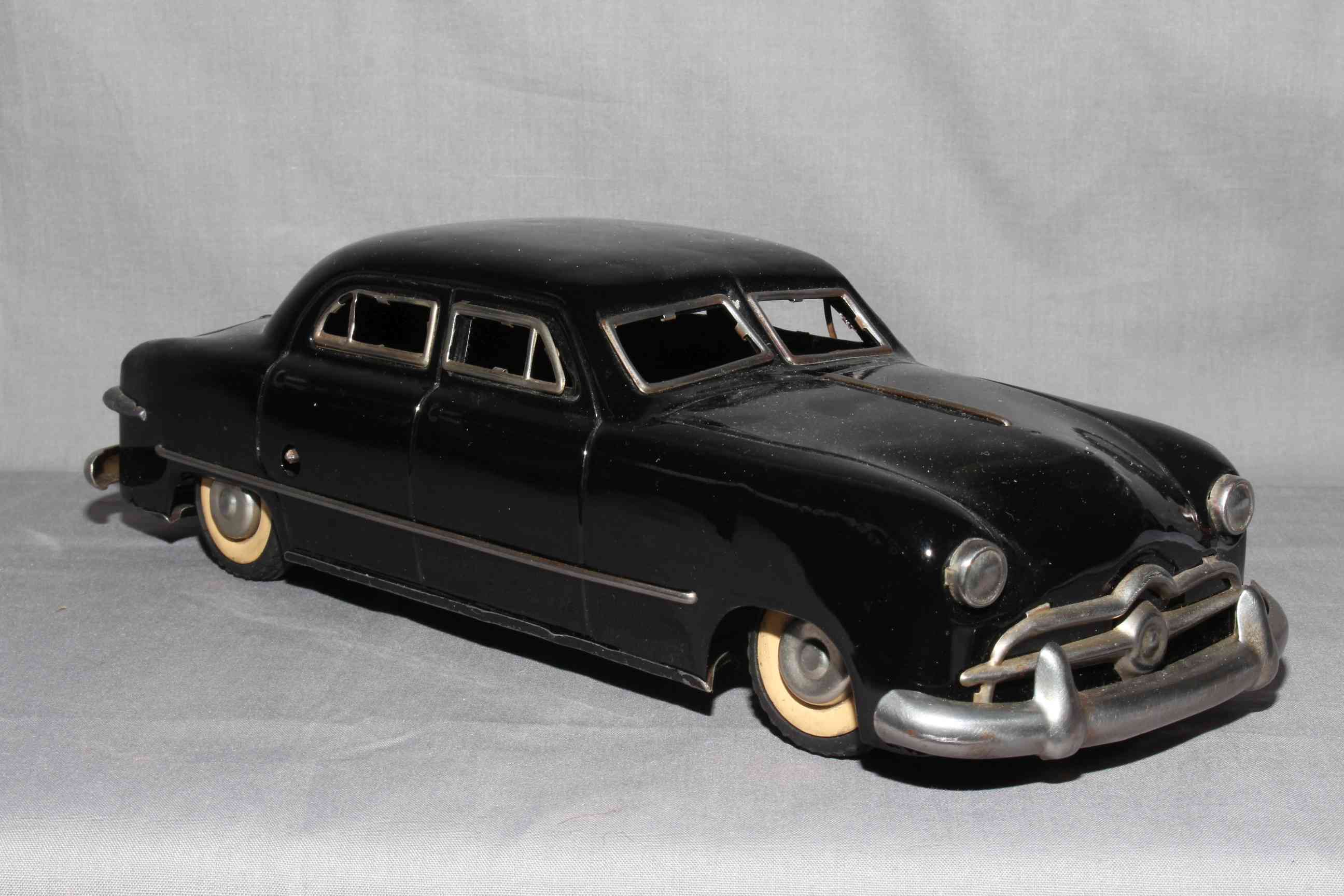 Gunthermann US Zone Germany clockwork tinplate Ford Four Door Sedan.