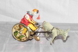 Lehmann Balky Mule clockwork toy. Original paint and clothing. Very Good clockwork motor works.