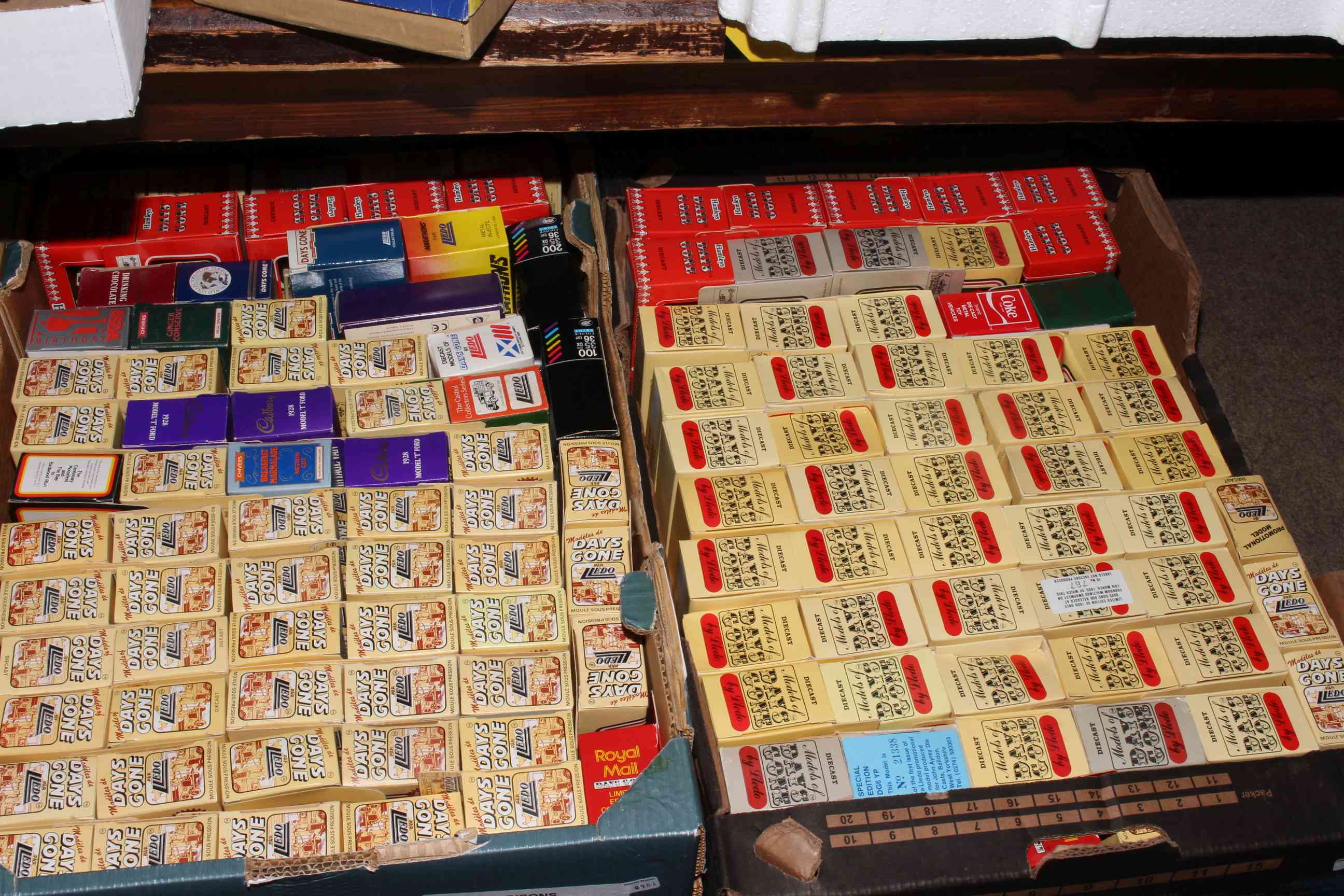 Two boxes of Lledo Days Gone model vehicles.