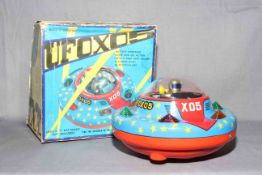 TM Toys (Masudaya) battery operated tinplate Flying Saucer UFO X05. Excellent in Good creased box.