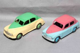 Dinky 154 Hillman Minx and 159 Morris Oxford. Very Good unboxed.