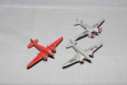 Three x Dinky Aircraft. Two x 62m Light Transport and pre war 60g Comet.