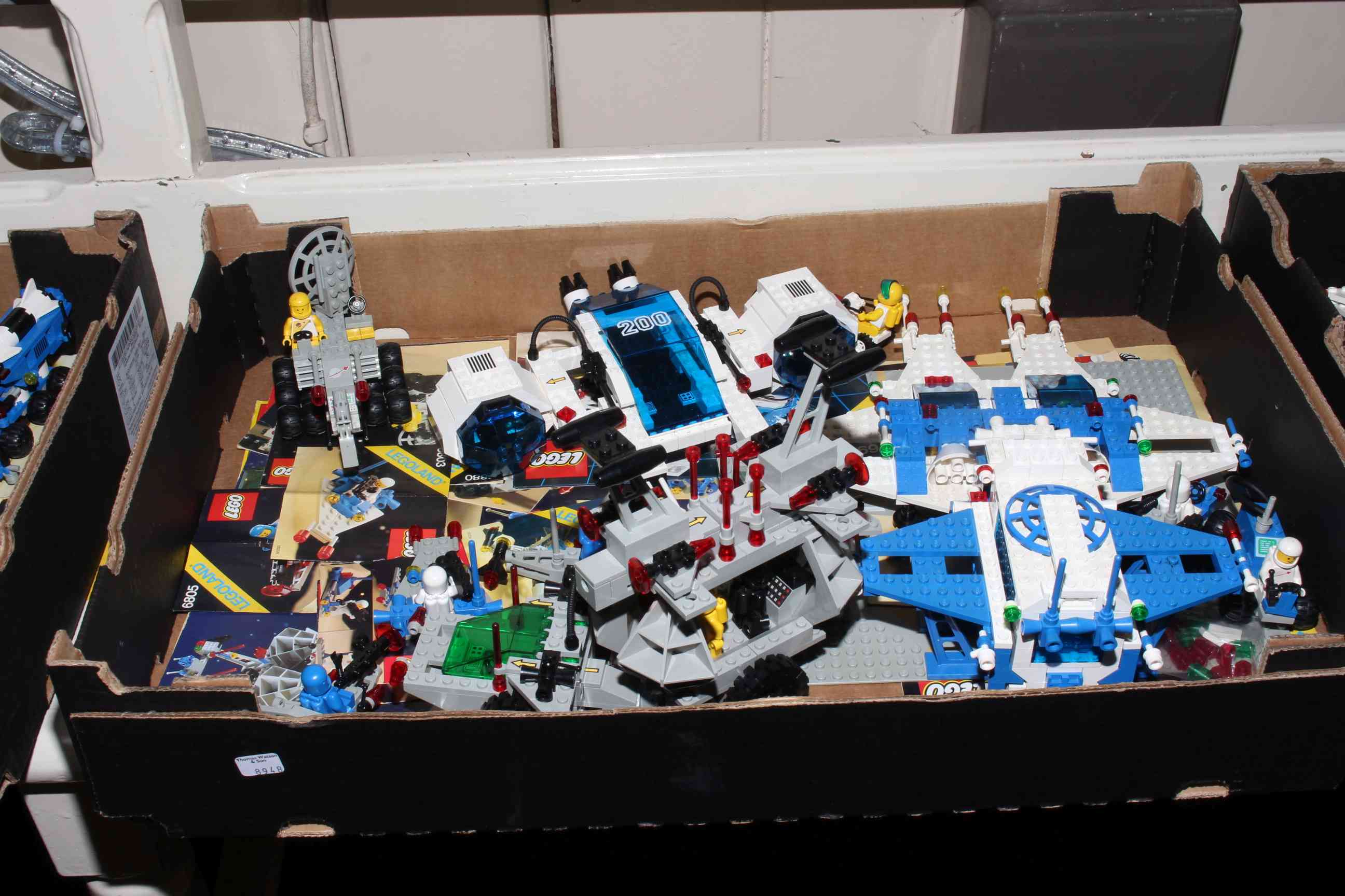 Collection of Lego models, numbers 6980, 6932, 6952, 6824, 6803, 6805, 6880.