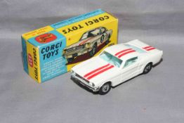 Corgi Toys 325 Ford Mustang Fastback Competition Model. Near Mint in Excellent box.