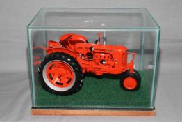 Franklin Mint 'The Case SC Farm Tractor' in glazed case.