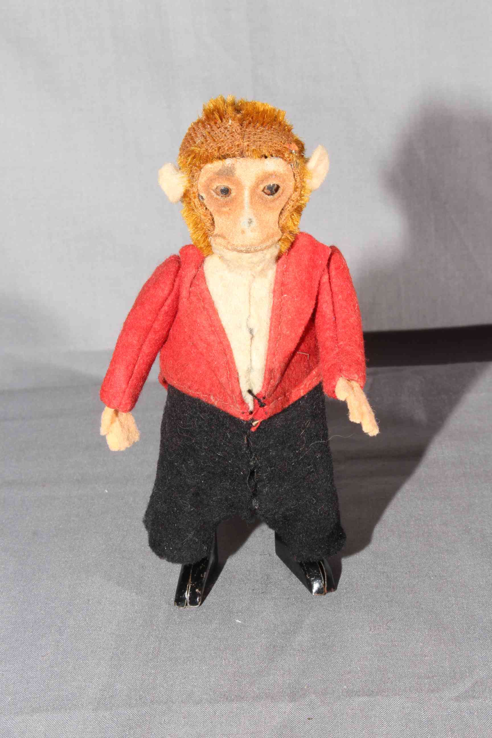 Clockwork Monkey Circus Ringmaster. Original clothes. Very Good, clockwork motor works.