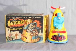 Marx battery operated Batcraft with flashing light and tricky action.