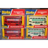 Four x Dinky 289 Routemaster Bus with different liveries. Near Mint in Very Good boxes.