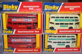 Four x Dinky 289 Routemaster Bus with different liveries. Near Mint in Very Good boxes.