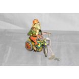 Arnold Germany US Zone clockwork tinplate Monkey on Tricycle. Very Good clockwork motor works.