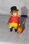 Schuco clockwork Monkey with Suitcase. Original clothes. Excellent clockwork motor works.