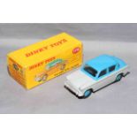 Dinky 175 Hillman Minx Saloon. Near Mint in Near Mint box with correct colour spot.