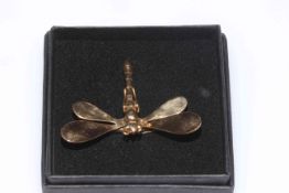 America Reinard 14k gold dragonfly clip brooch with spring hinged wings, 5cm across.