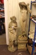 Two weathered classical garden figures, one raised on plinth, 156cm including plinth, and 120cm.
