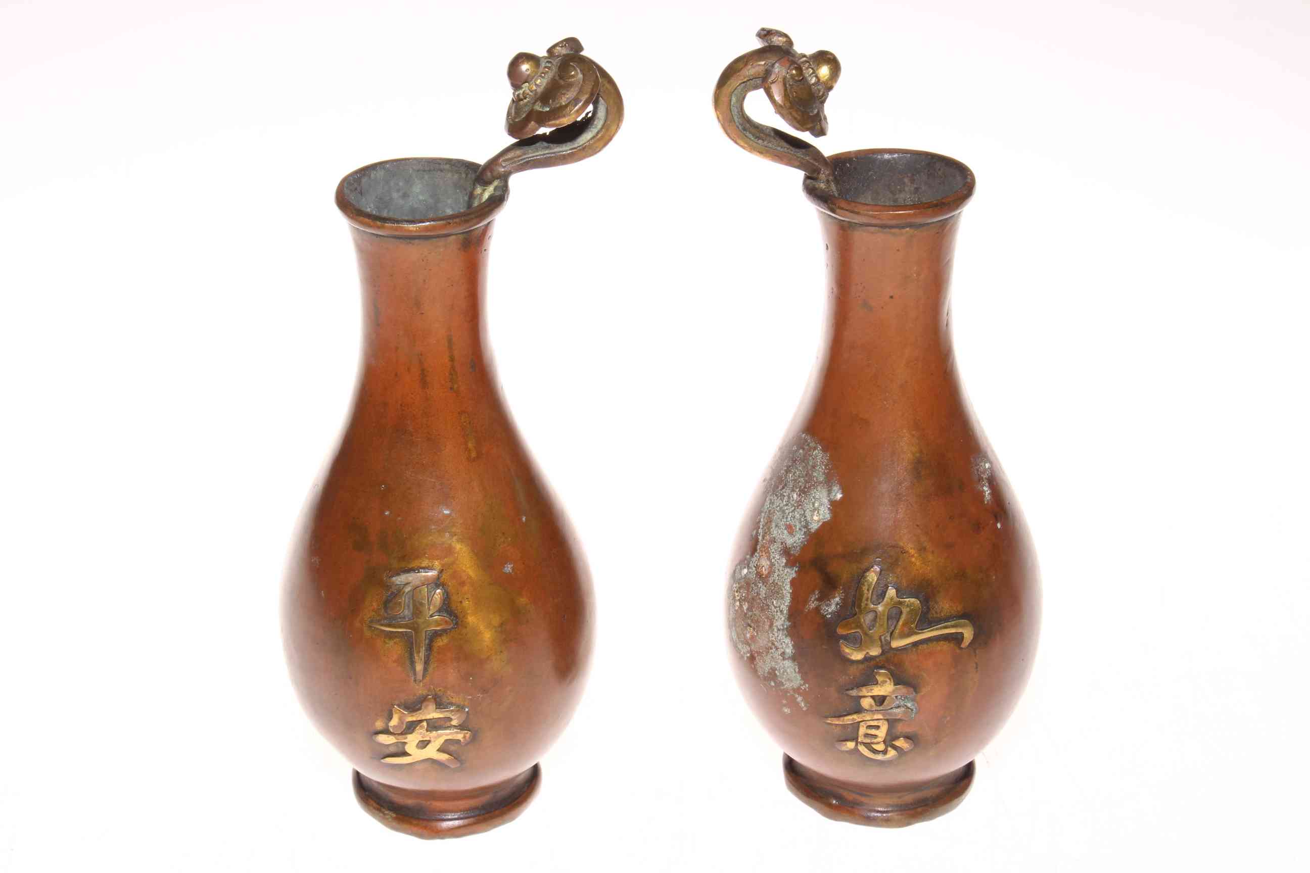 Pair Oriental bronze vases, 22cm.
