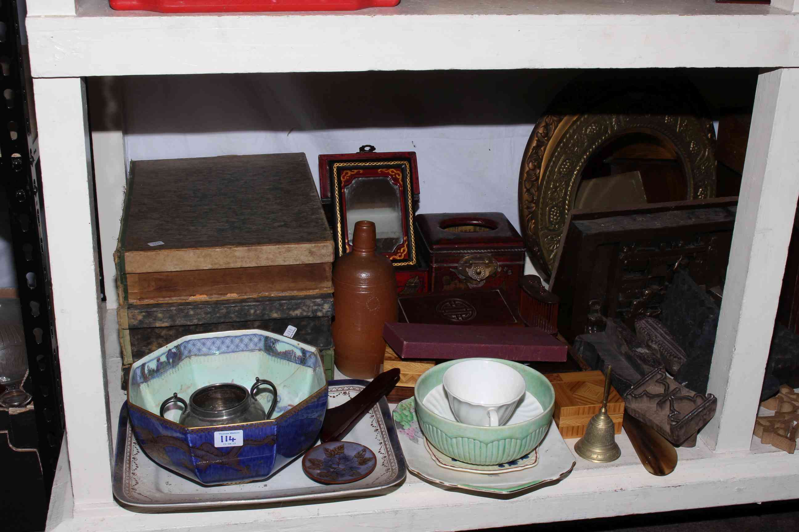 Full shelf of collectable including sewing machine, lace bobbins, knitting sheaths,