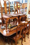 Mahogany twin pedestal extending dining table and leaf,