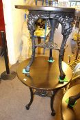 Two little used circular cast base pub tables, 70cm high by 68cm diameter.