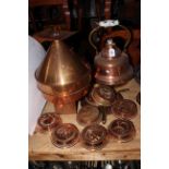 Collection of copper including two kettles, jelly moulds and other kitchenalia.