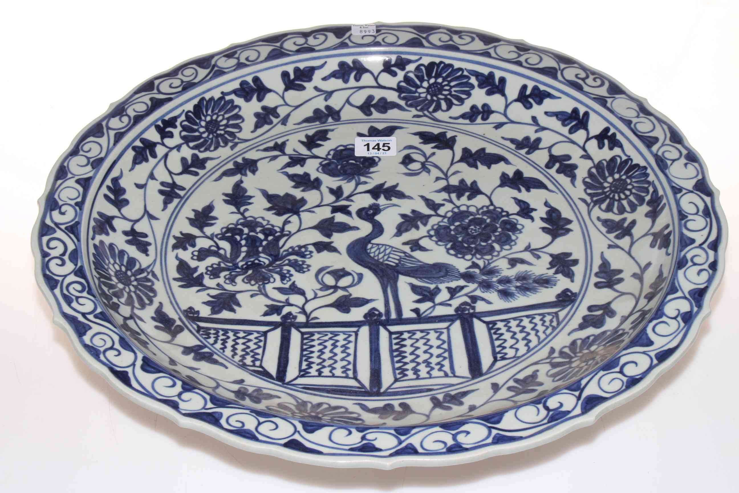 Oriental blue and white charger decorated with exotic bird and flora, 45cm diameter.