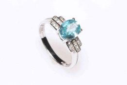 Two 9k gold rings, one white gold and set with Ratanakiri blue zircon,