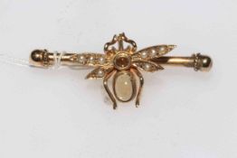 9 carat gold insect bar brooch having well modelled insect with incised detail on square section