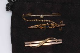 Three early 20th Century bar brooches, set with seed pearls.