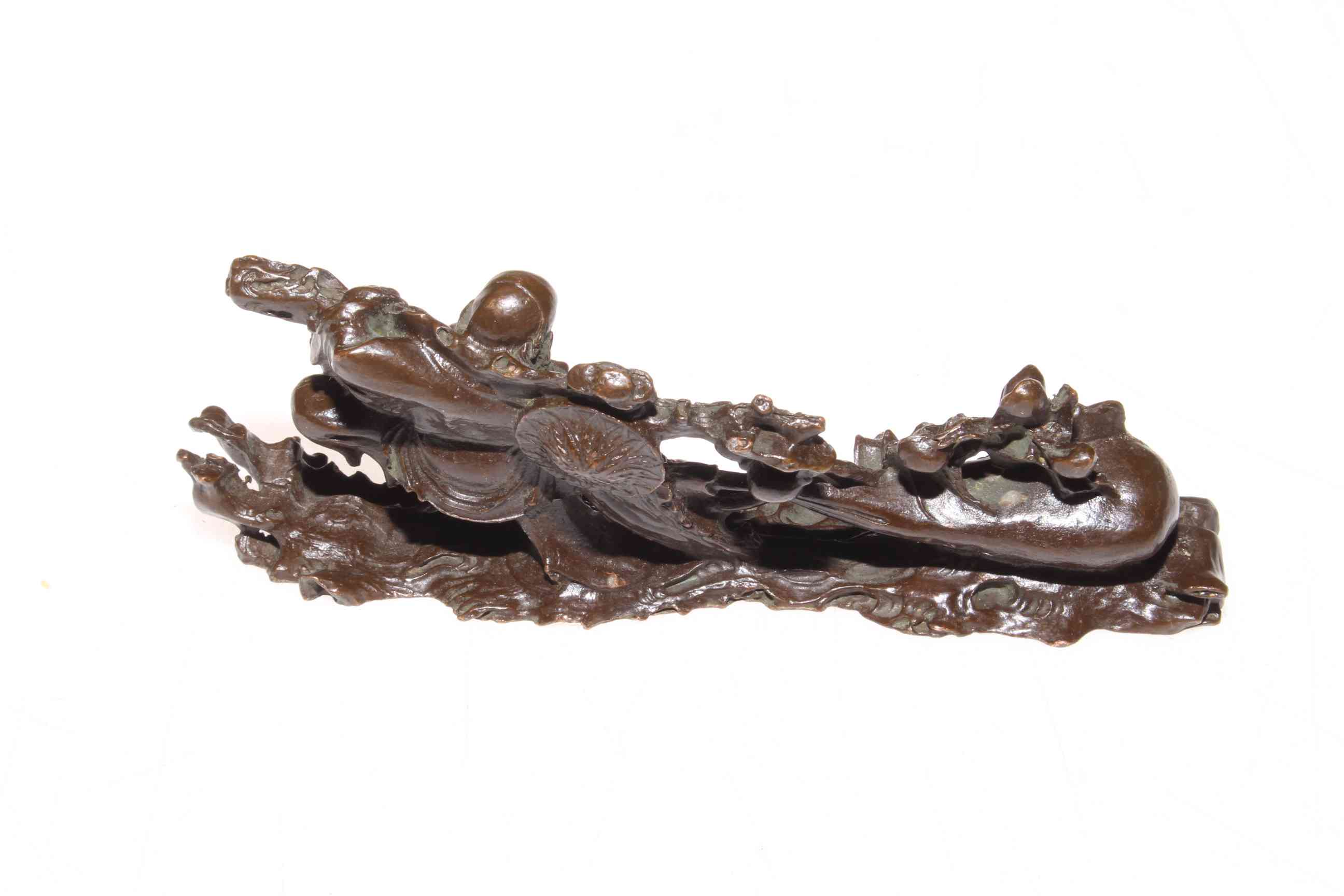 Chinese bronze of Buddha pulling along a gourd, 13cm length. - Image 2 of 2