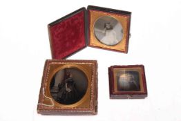 Four daguerreotype cased portrait photographs, one military.