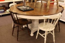 Circular white and pine pedestal dining table,