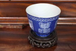 Chinese Republic deep blue decorated bowl and wood stand, 9cm including stand.