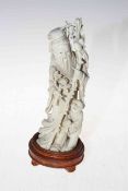 Japanese ivory Okimono of elder and child, seal mark to base, 21cm, with wood stand.