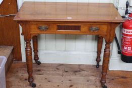 Late 19th/early 20th Century walnut single drawer side table in turned legs, 75cm by 92cm by 50cm.